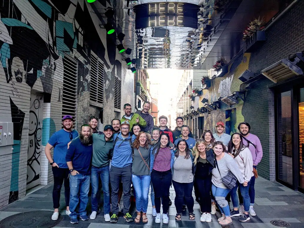 A corporate team posed during our Market and Food Hall Tour