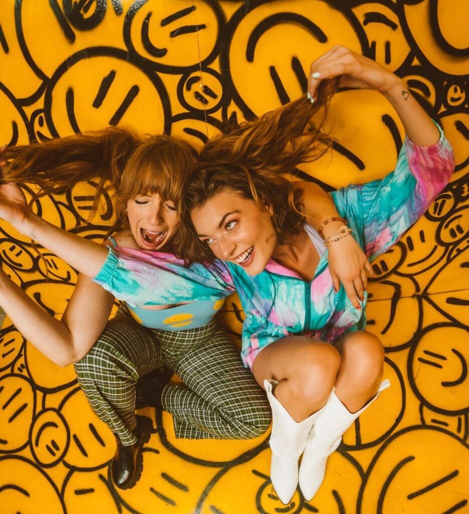Two women posed at the Denver Selfie Museum