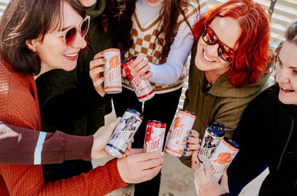 A group of women posed with Infinite Monkey Theorem beverages