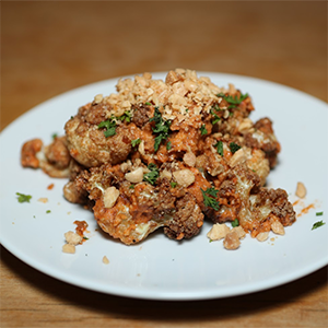 Botellon Denver Crispy Cauliflower with Romesco, Marcona Almonds and Roasted Tomato