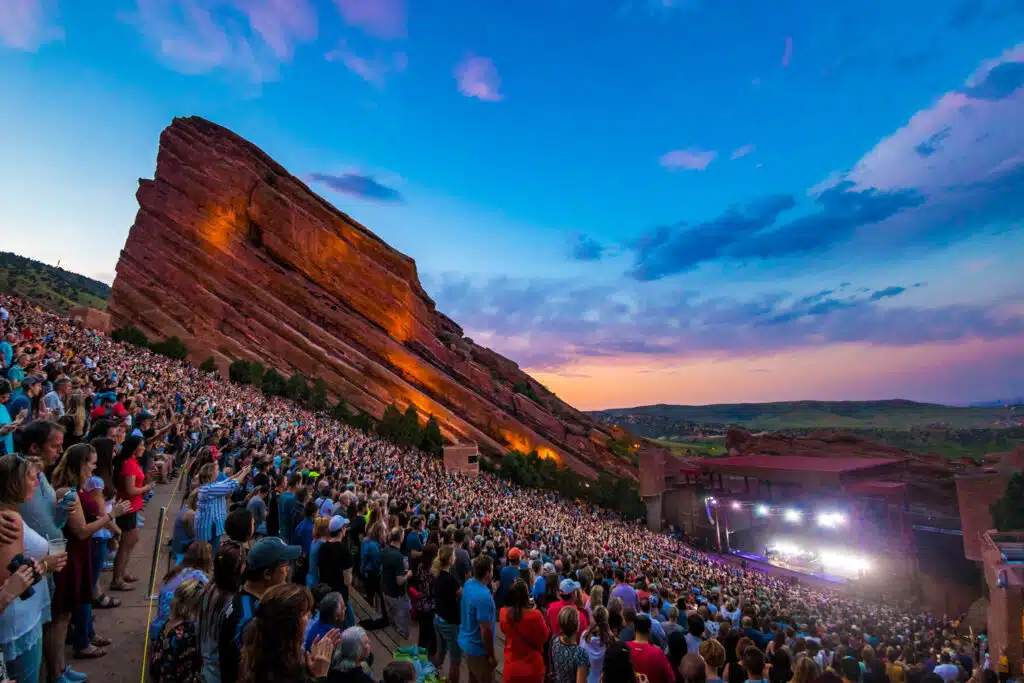 A crowd attending a concert at Red Rocks Amphitheatre