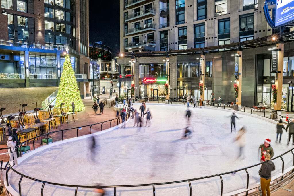 mcgregor square ice rink with lit christmas tree behind