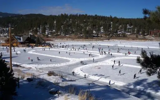 Ice skaters and hockey players on Evergreen Lake