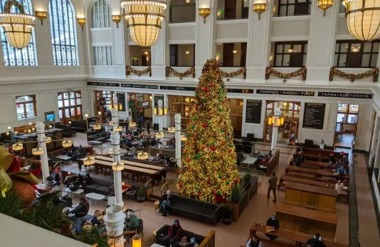 A tall Christmas tree in the Grand Hall of Denver's Union Station