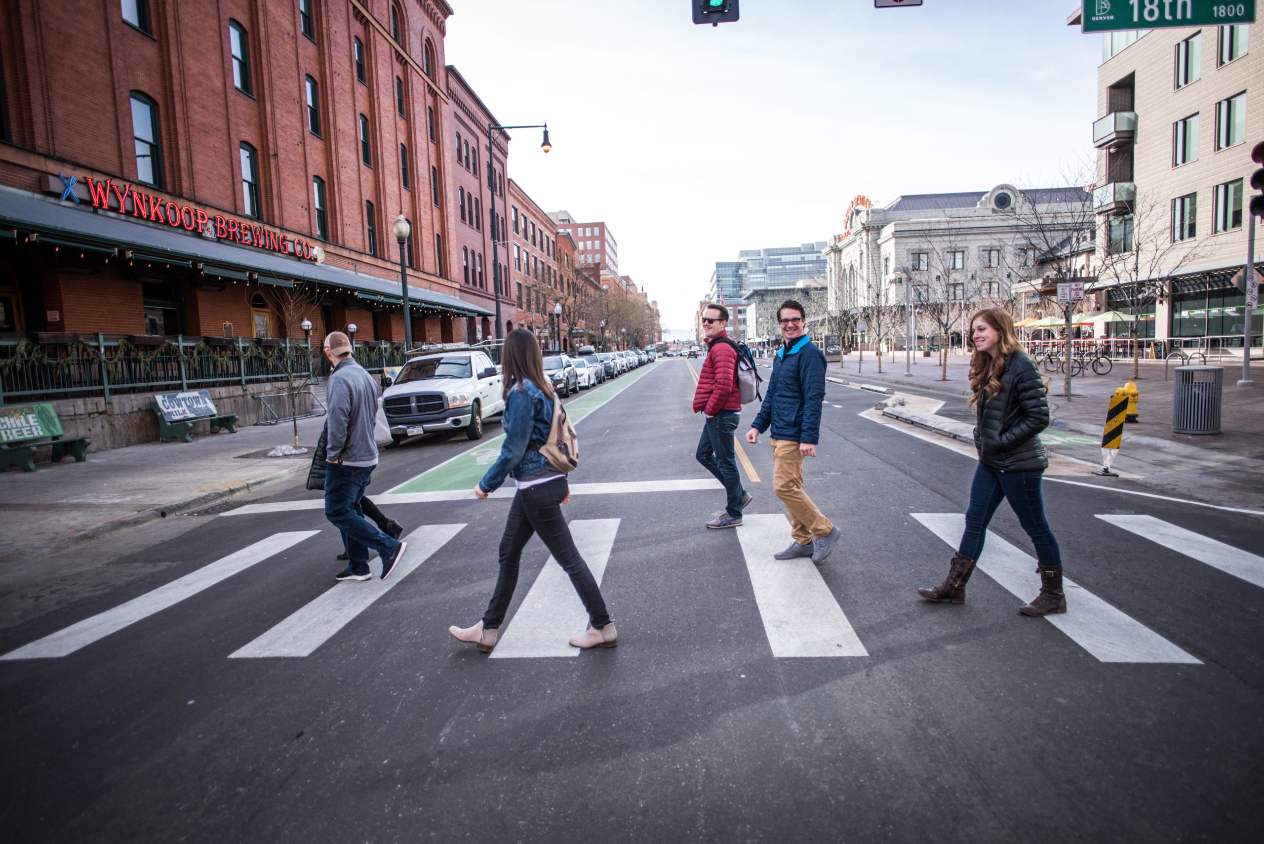 Food Tour Guide crossing street with group