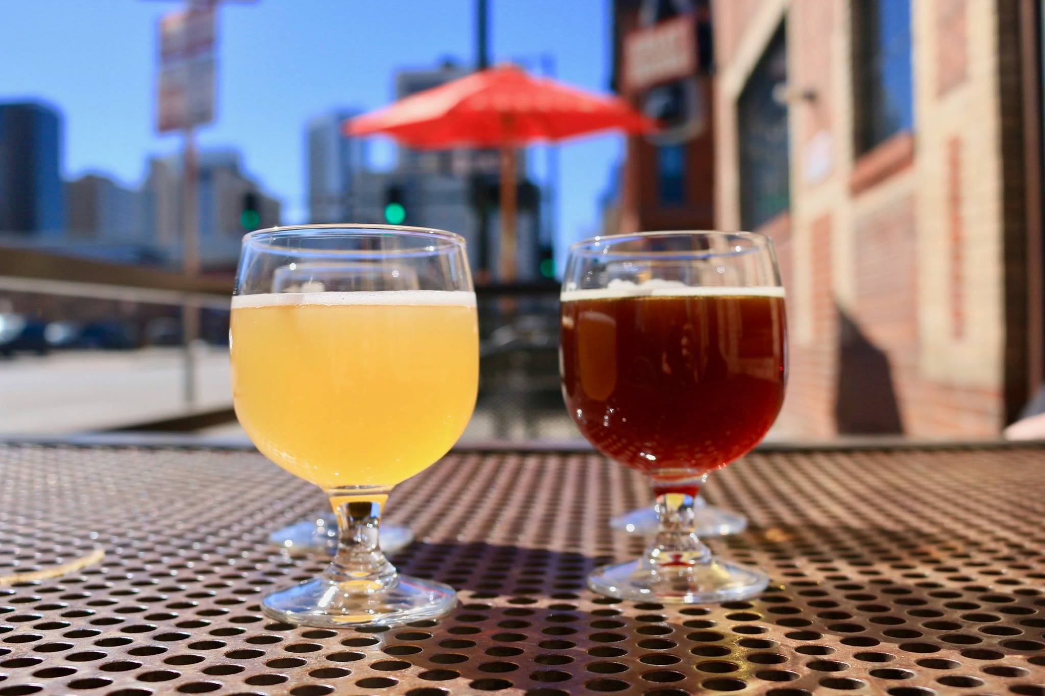 Two beer glasses on Great Divide Brewing's patio