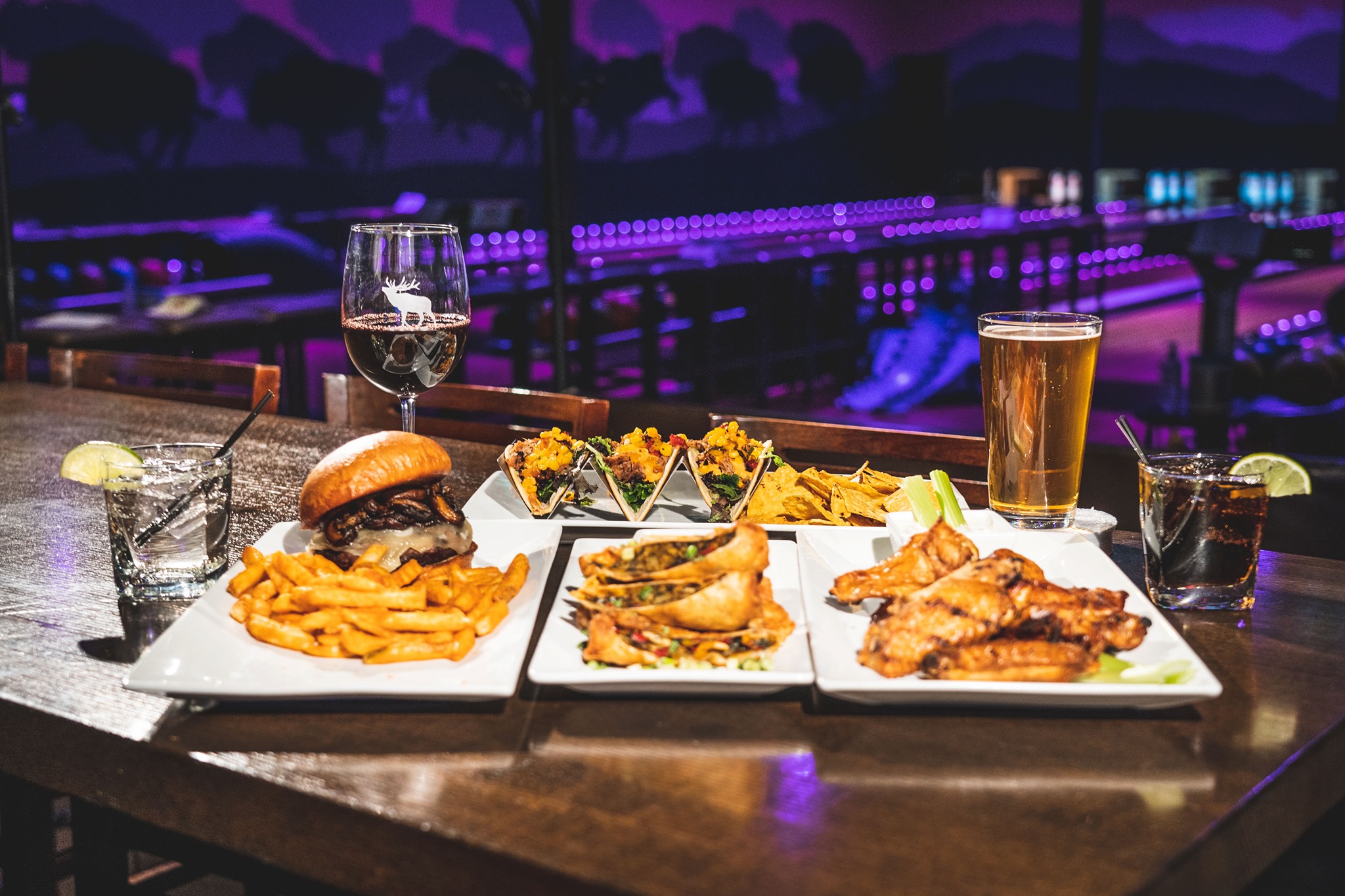 Pub grub backdropped by the bowling alley at The Wild Game Entertainment Experience 