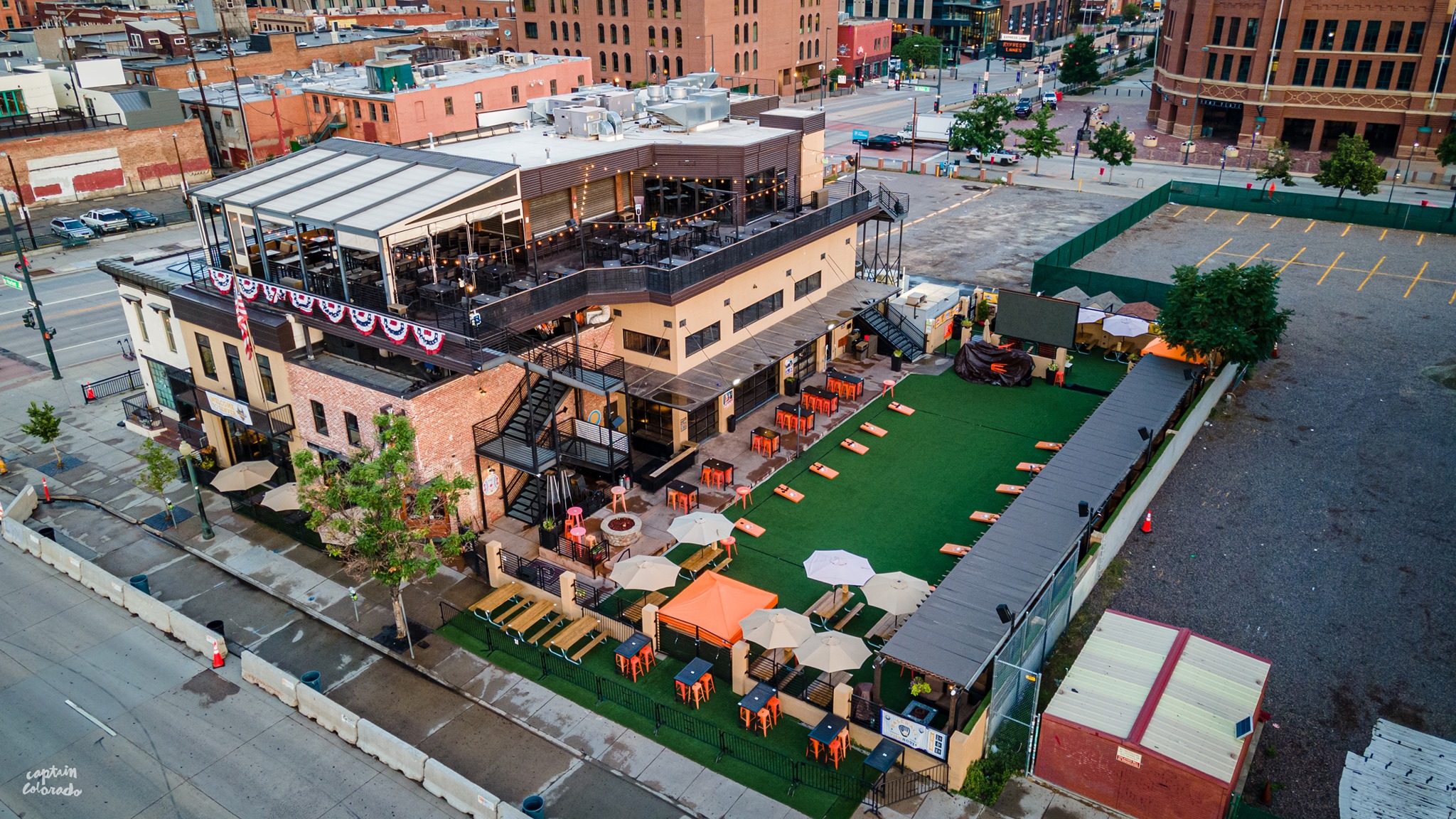 The exterior of ViewHouse, featuring a deck and spacious patio