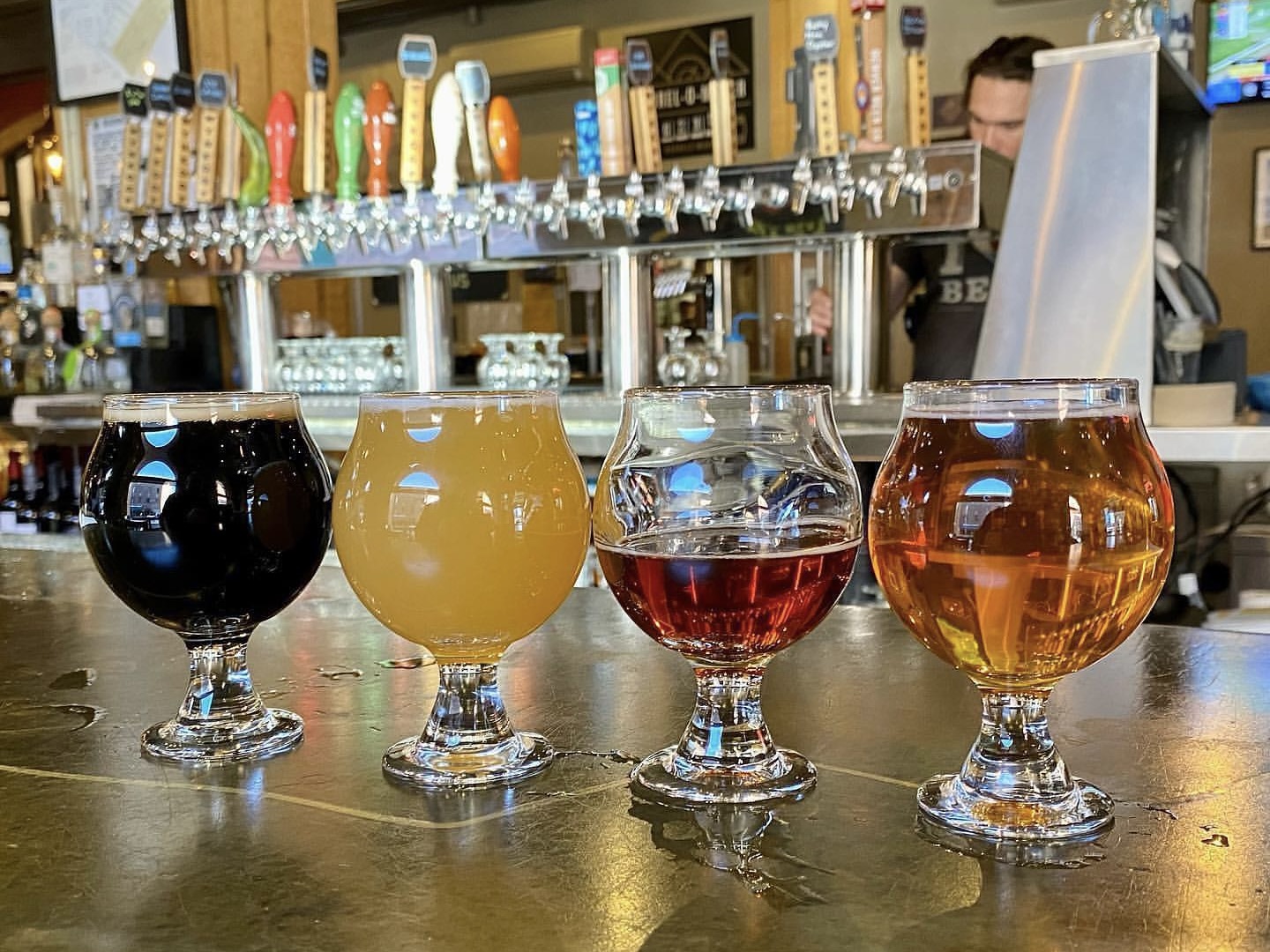 A beer flight at Wynkoop Brewing Company