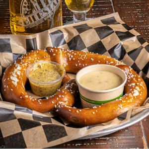 bavarian pretzel with beer cheese on RiNo Food Tour