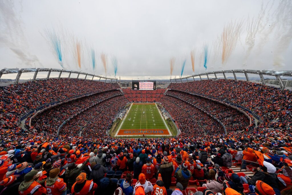 Thousands of Broncos fans dressed in orange inside Empower Field on game day