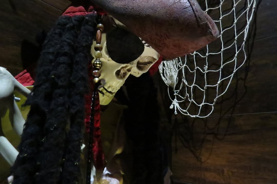 A skull pirate prop inside EscapeWorks in Denver