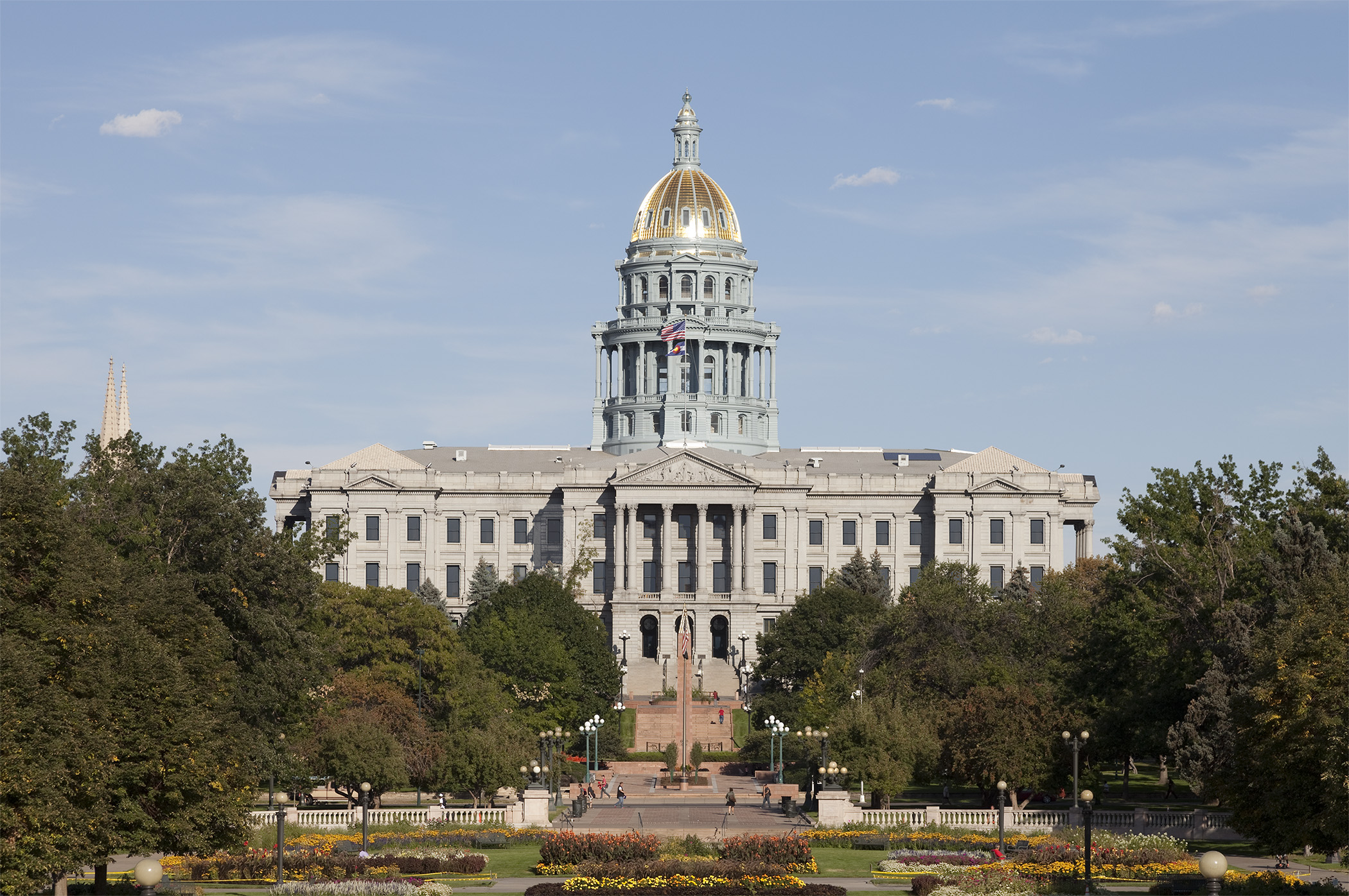 The exterior of the Colorado State Capitol building featuring its iconic golden dome