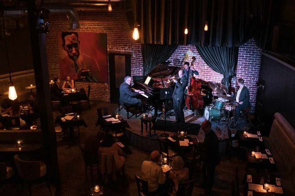 A jazz band performing in Nocturne's dim listening room