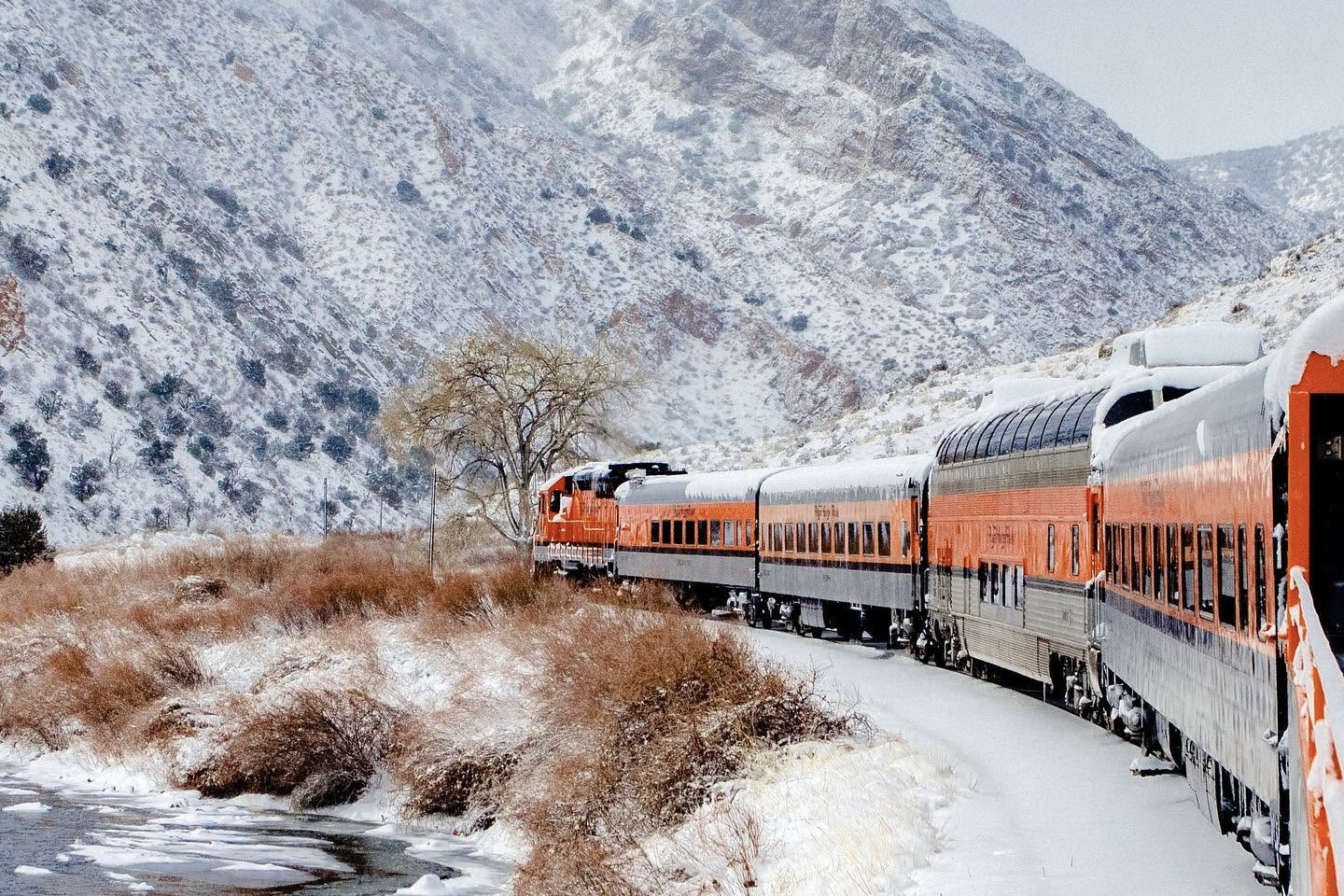 The Royal Gorge Route Railroad traveling through the snowy canyon