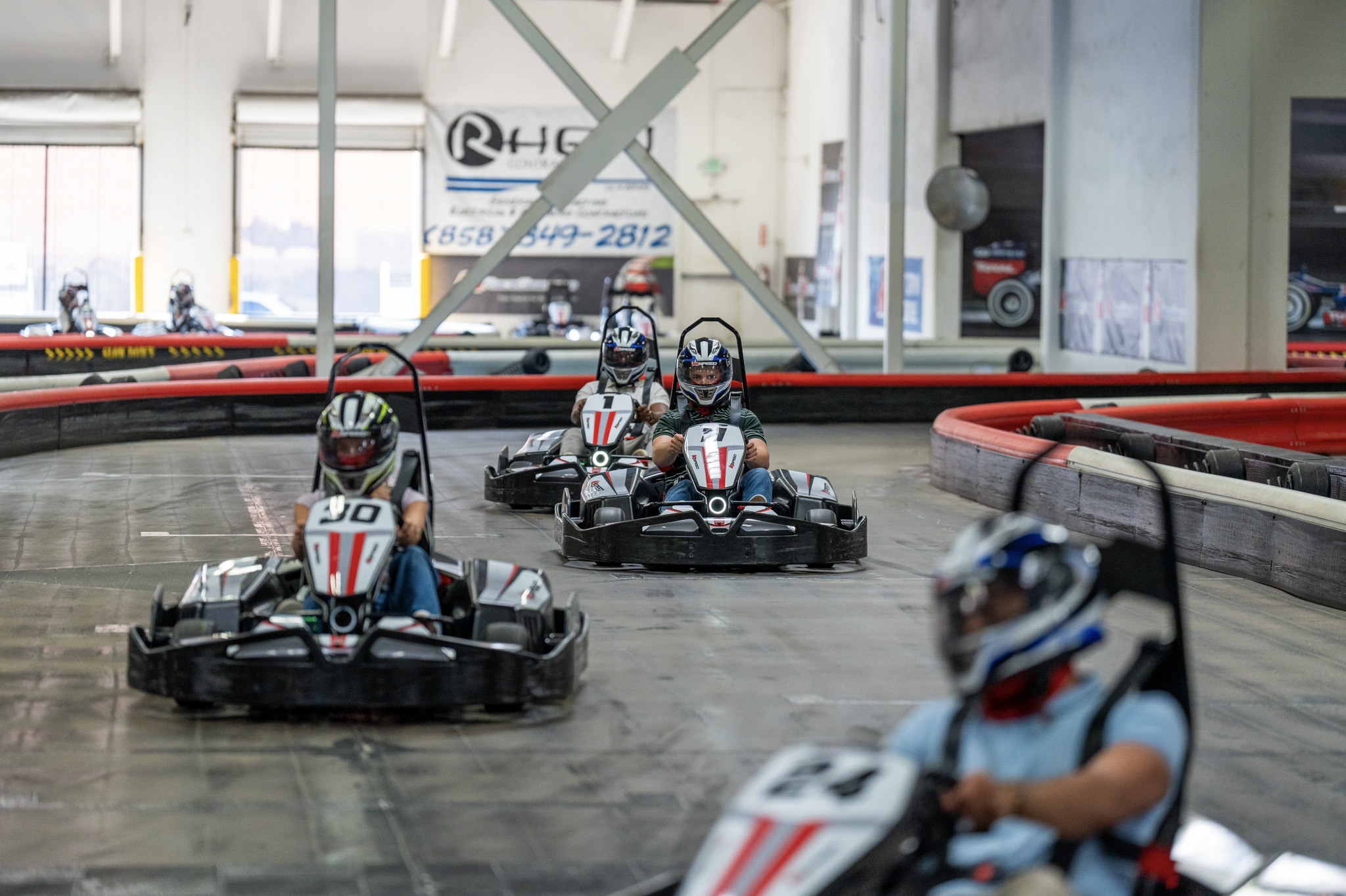 A corporate team go-karting at K1 Speed in Littleton