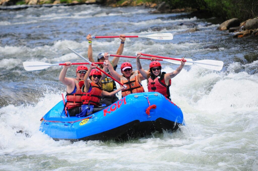 A corporate team on a whitewater rafting tour with KODI in Idaho Springs