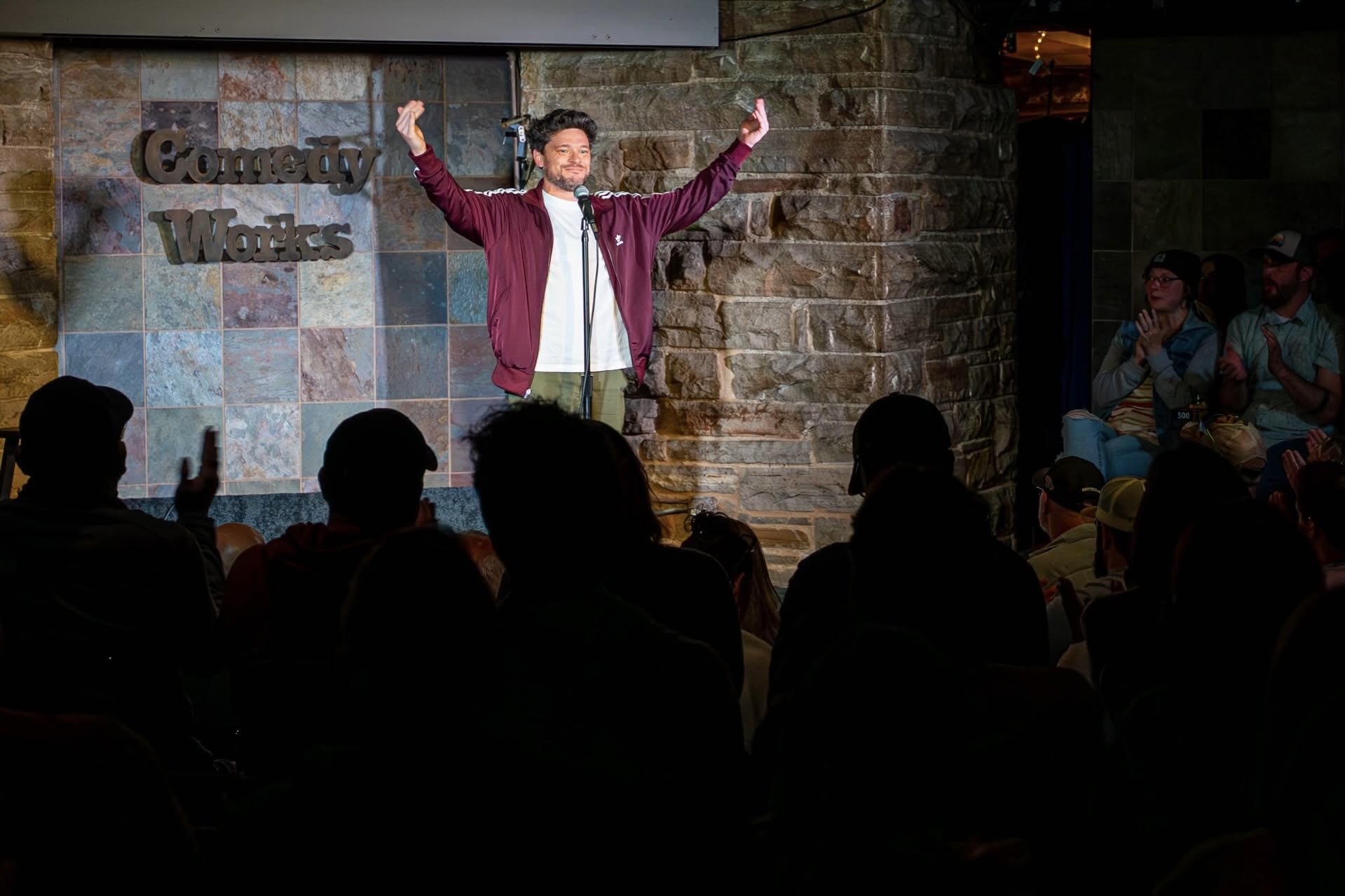 A comedian on stage at Comedy Works