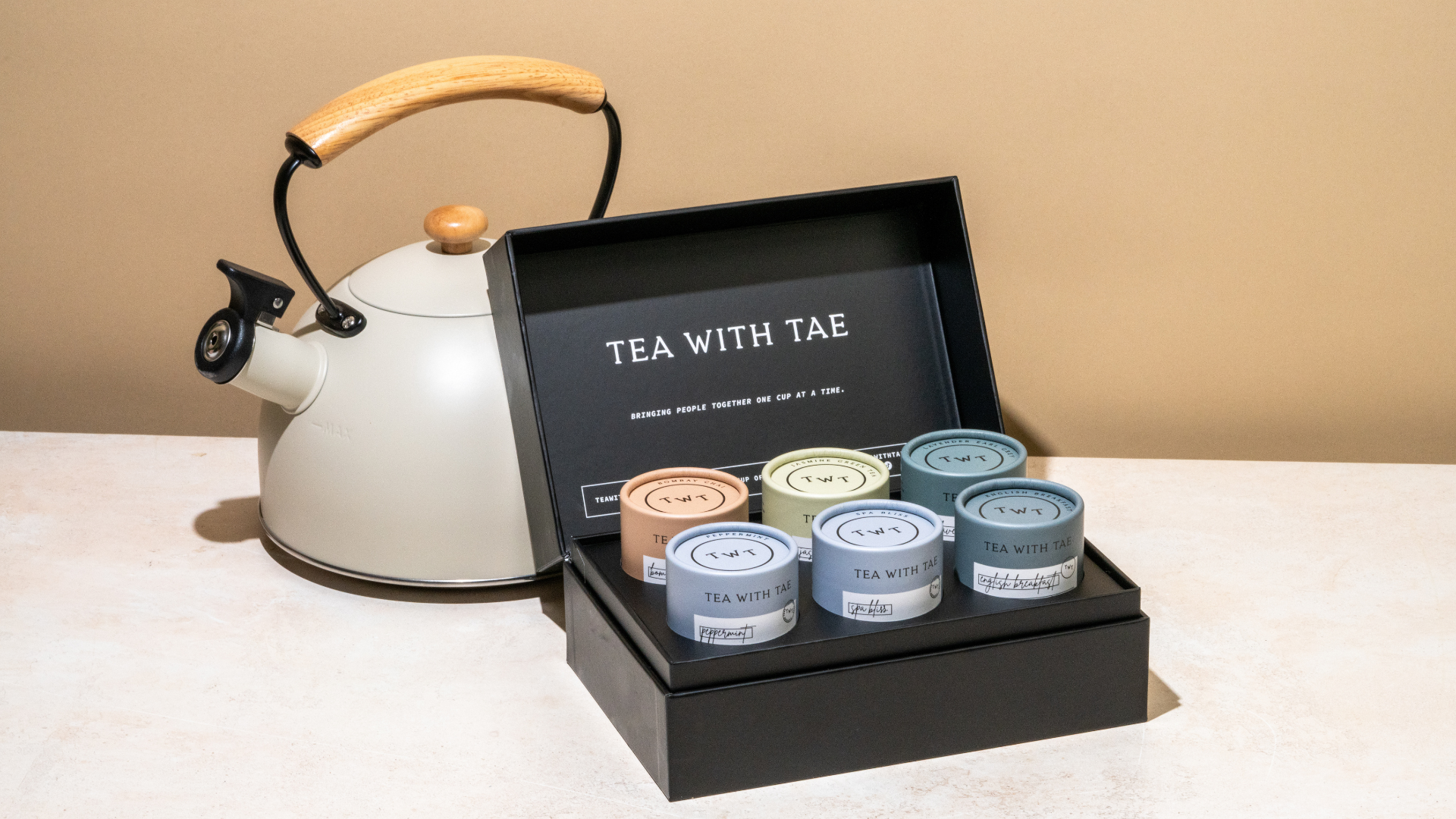 The Tea with Tae bento box featuring six mini tubes full of tea sachets