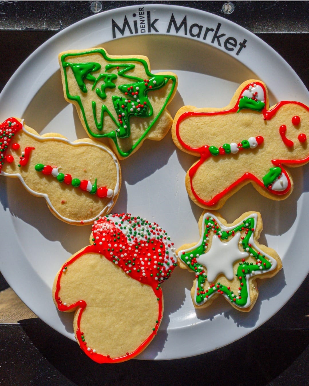 holiday cookies from denver milk market on a white plate