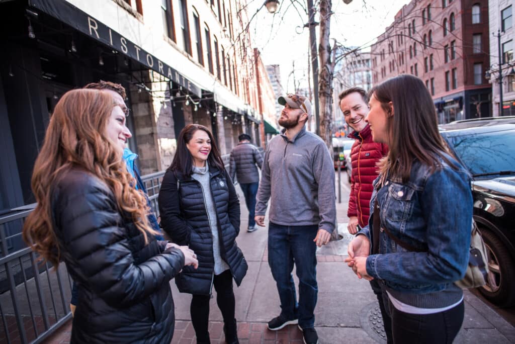 delicious denver food tours guests standing outside in lodo denver