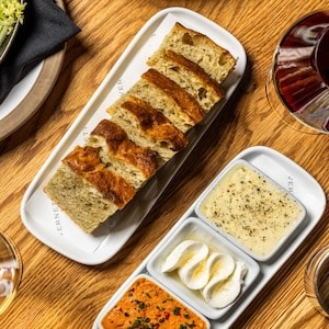 focaccia on plate with whipped butter from tavernetta on downtown dinner tour